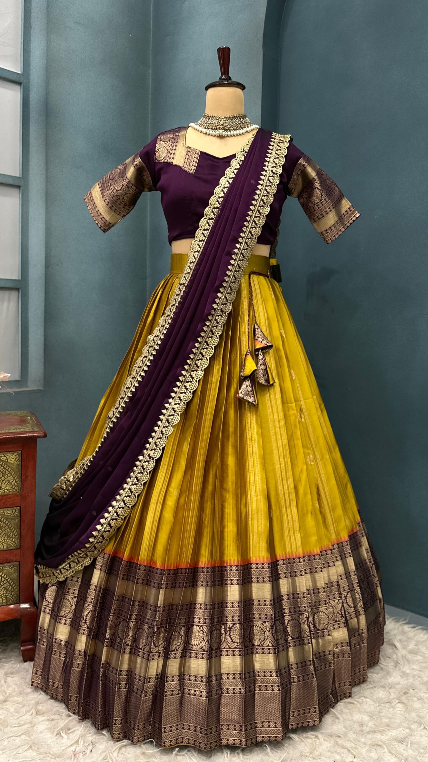 This exquisite kanjivaram silk with all over butte with jacquard border lehenga